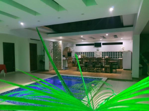 MANSÃO FRENTE A PRAIA - Locação de Suítes Privativas
